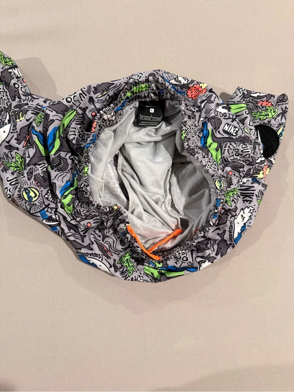 Nike Kids Gray Swim Trunks with Bright Graphic Print